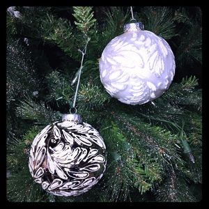 2 large embossed glass ornaments